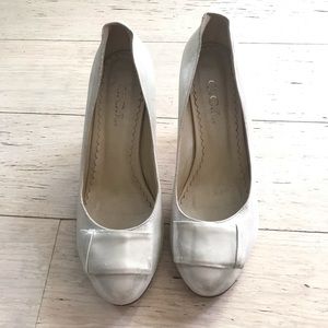 Shiny white heels (size 10)